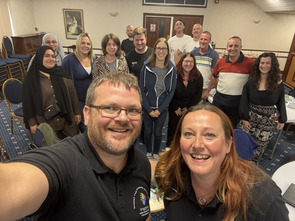 Phil and his co-trainer with a room full of trainee driving instructors on an Inspire Instructor Training course
