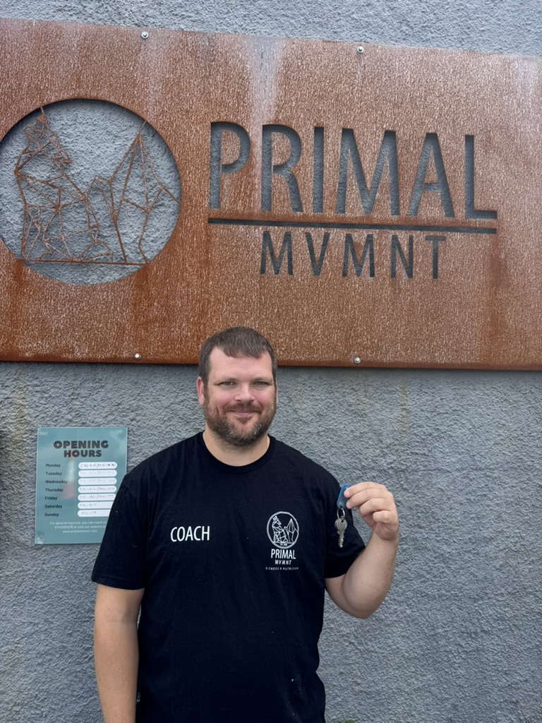 Phil in his coach t-shirt outside the Primal Mvmnt gym