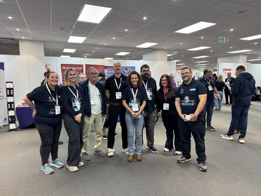 The Support Driving School team together at a driving instructor expo